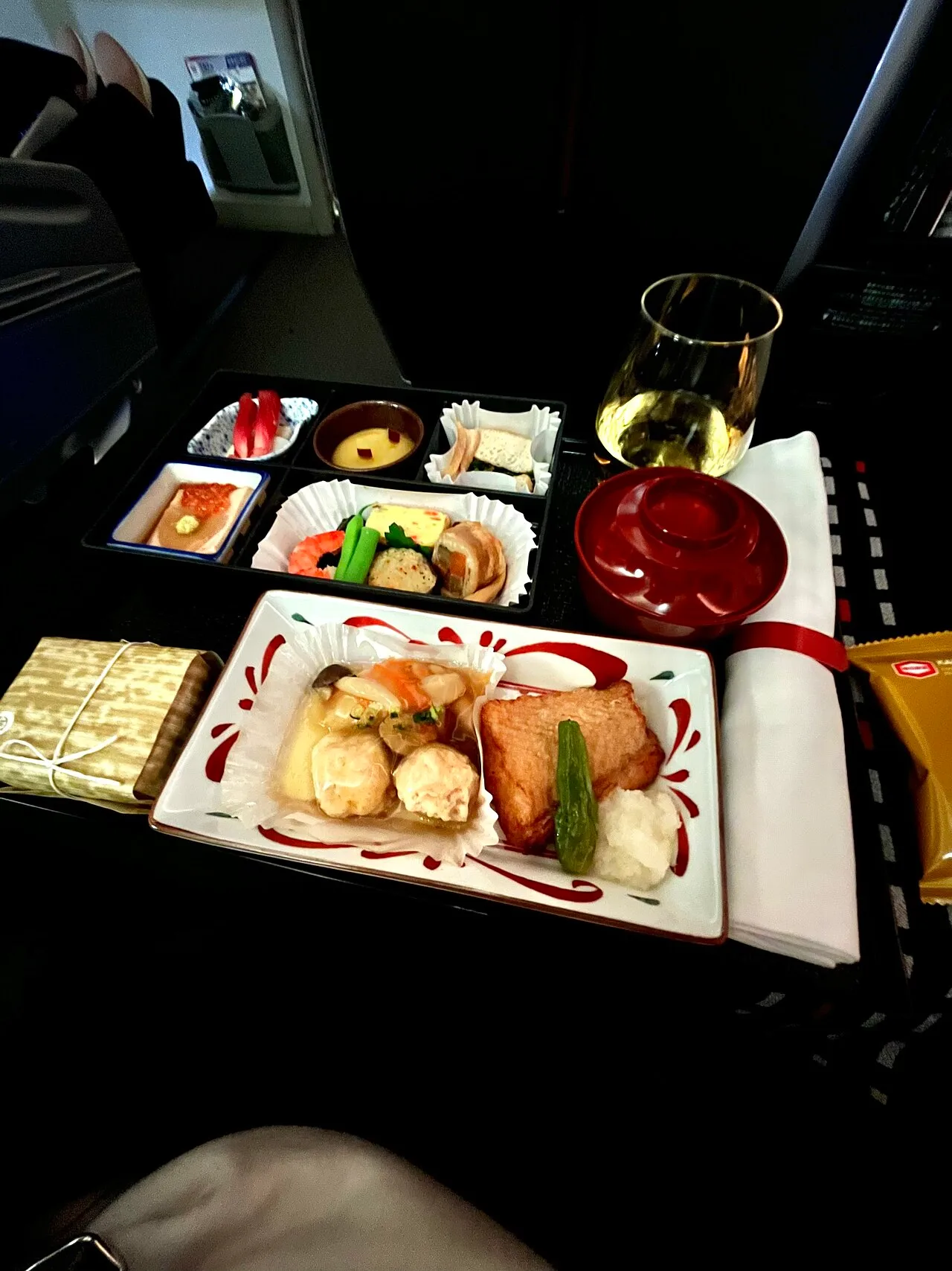 A JAL business-class meal on Haneda–Manila